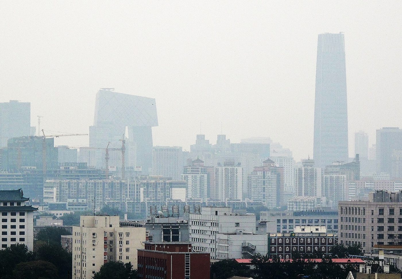 Beijing's skyline beneath a cloudy autumn sky