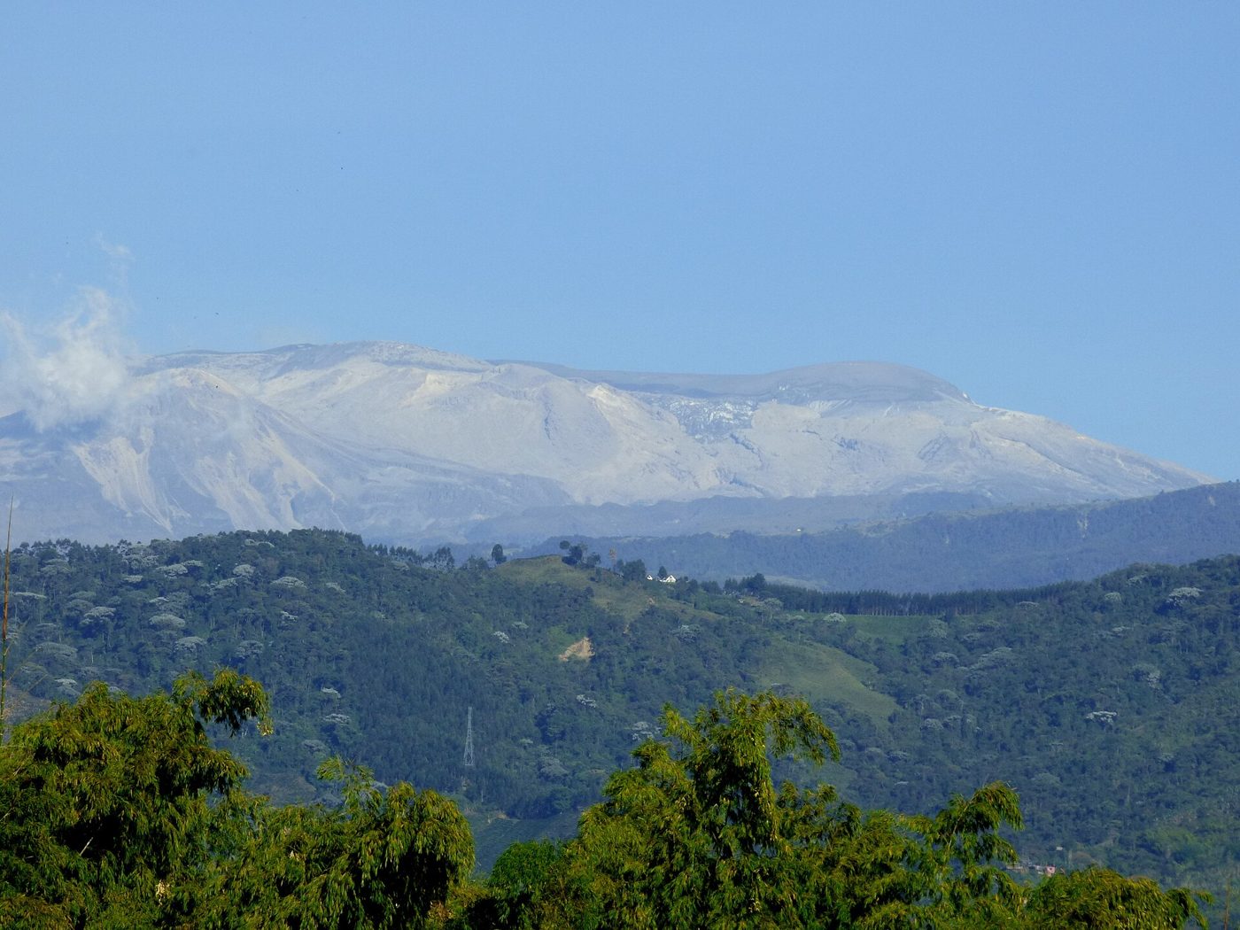 The snow-capped Nevado del Ruiz volcano seen from the hills above Pereira, one of the Colombian cities hit hardest by the earthquake