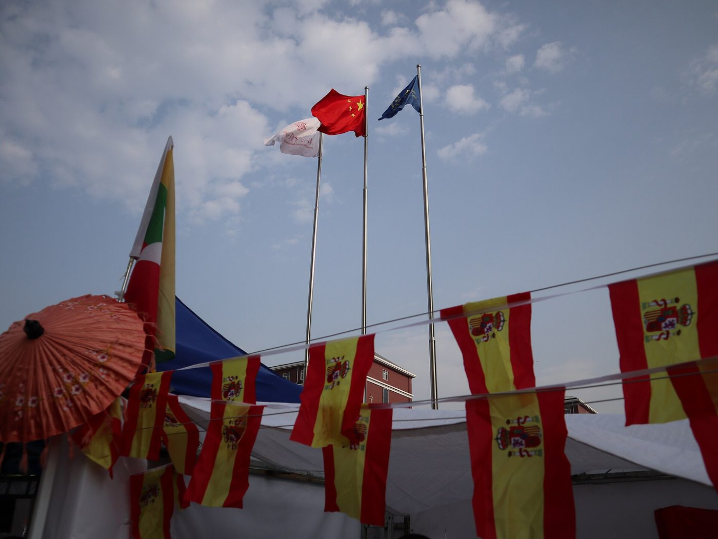 International flags, including China's, flying at the University of International Business and Economics international culture festival in Beijing