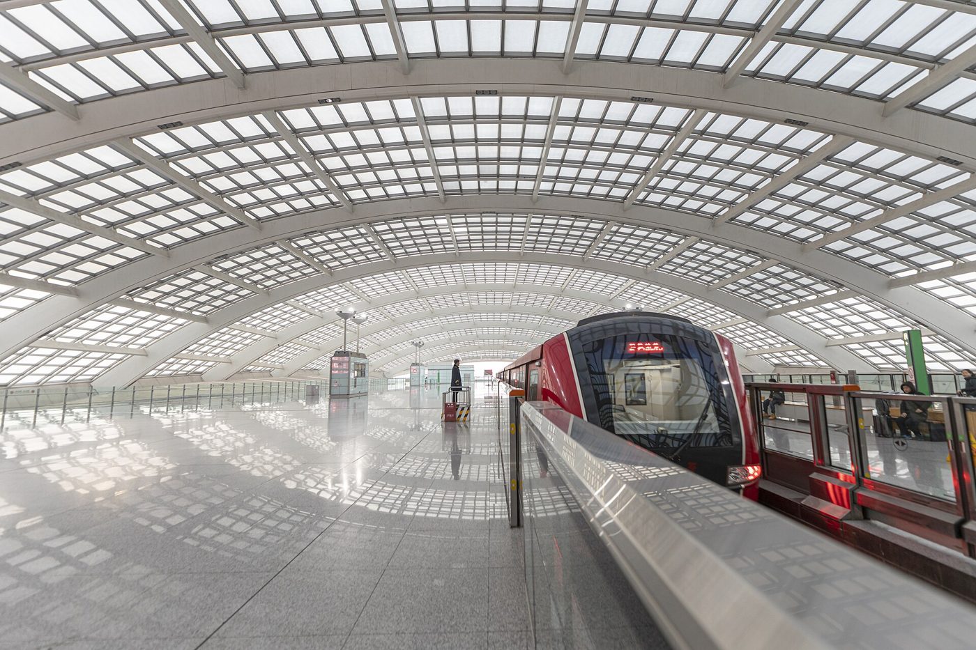 Beijing Capital International Airport terminal building seen from outside on a clear day