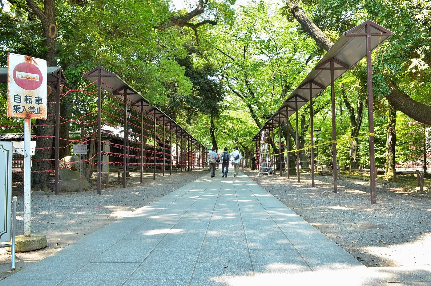 Yasukuni Shrine's main hall and torii gate in Chiyoda, Tokyo, Japan.