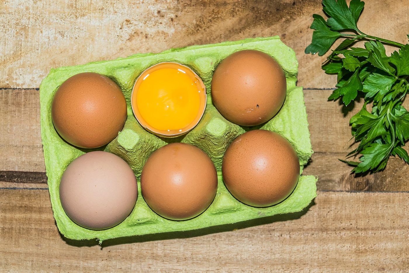 Cartons of fresh chicken eggs, white and brown