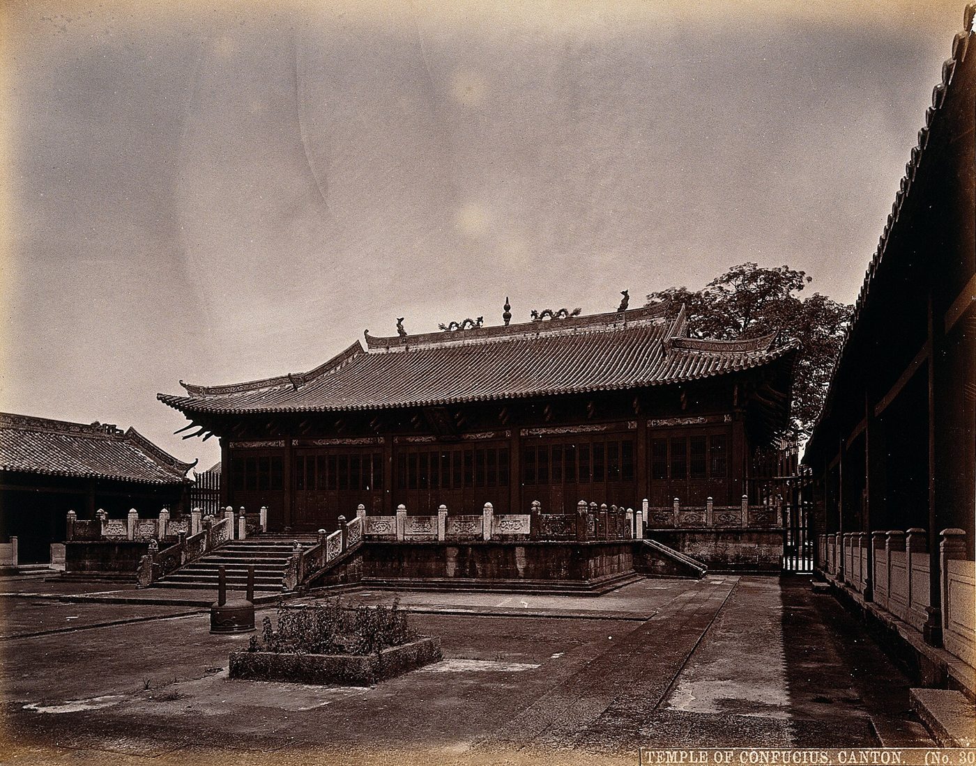 A black-and-white historical photograph of the Temple of Confucius in Canton (Guangzhou), China