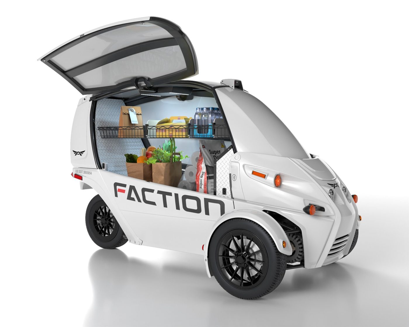 A small white driverless electric delivery vehicle used for last-mile logistics.