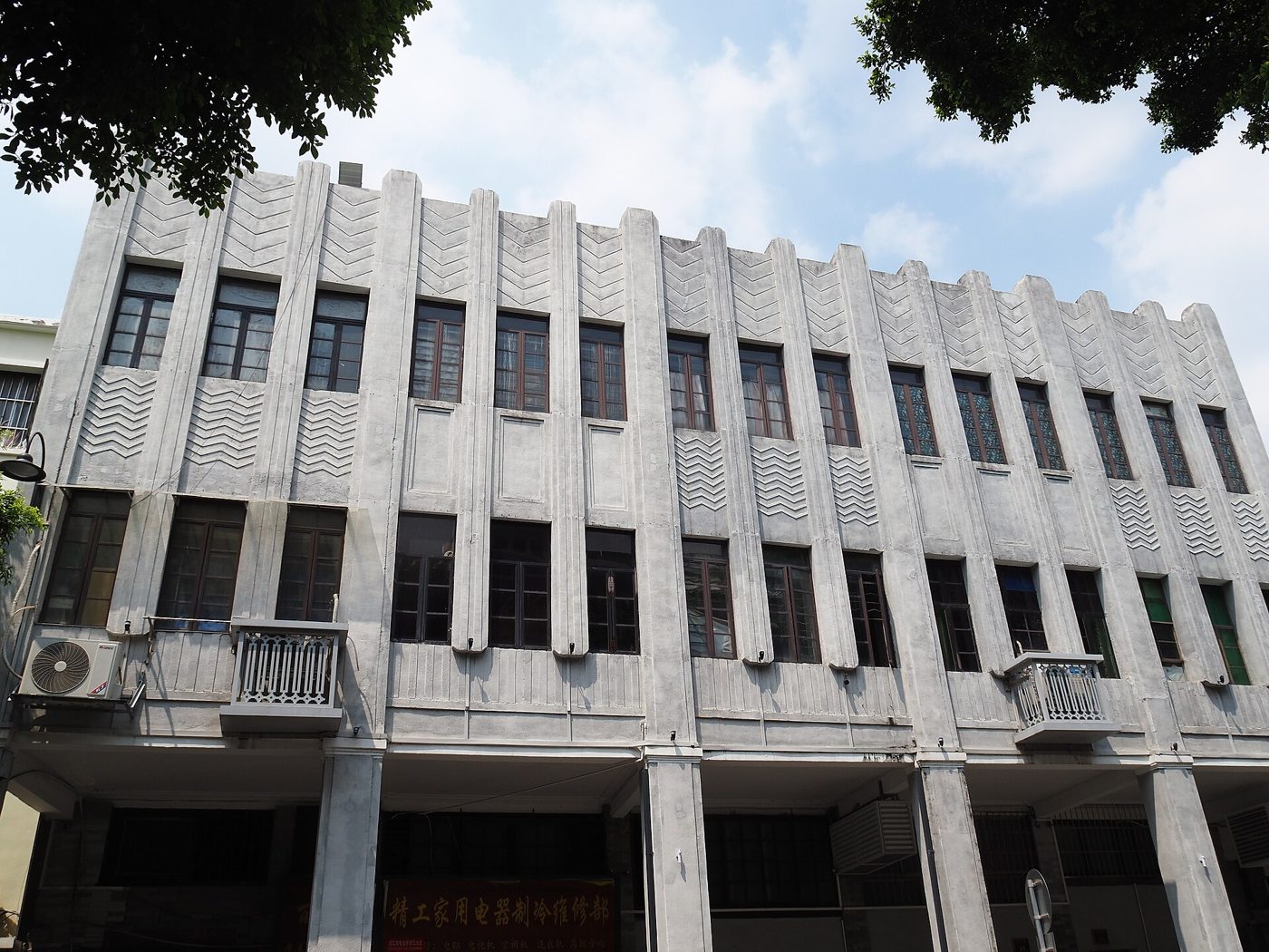 Grey brick qilou arcade houses along Enning Road in Guangzhou's Liwan district, near Yongqing Fang