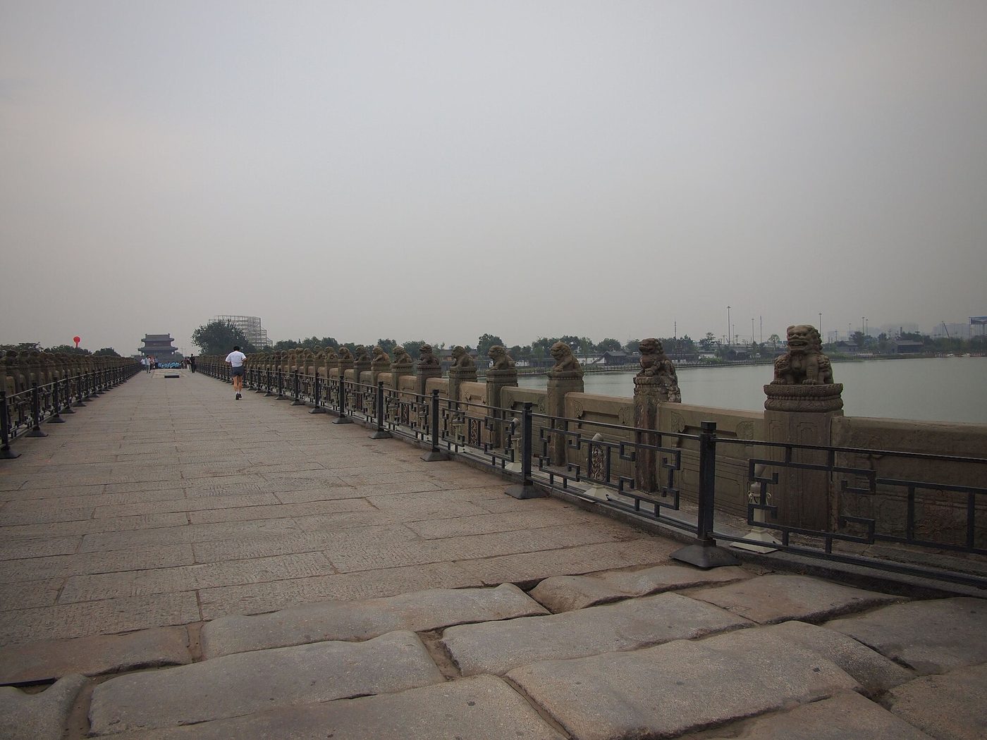 The old stone Lugou (Marco Polo) Bridge in Beijing, its balustrades lined with small carved stone lions.